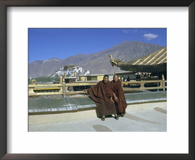 Two Tibetan Buddhist Monks At Jokhang Temple, With The Potala Palace Behind, Lhasa, Tibet, China by Sybil Sassoon Pricing Limited Edition Print image