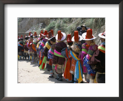 Line Of People Wearing Tibetan Traditional Dress, Tongren, Qinghai Province, China by Occidor Ltd Pricing Limited Edition Print image