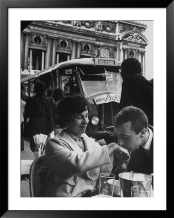 Man Kissing Woman's Hand At The Cafe De La Place De L'opera by Loomis Dean Pricing Limited Edition Print image