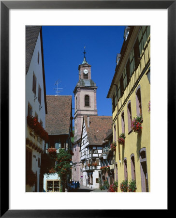 View To Church Tower And Timbered Houses, Riquewihr, Haute-Rhin, Alsace, France by Ruth Tomlinson Pricing Limited Edition Print image