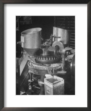 Machine Manufacturing Aspirin At Plant Operated By Boots Pharmaceutical Company by E O Hoppe Pricing Limited Edition Print image