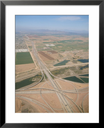 An Aerial View Of A Highway System Near The Phoenix Airport by Rich Reid Pricing Limited Edition Print image
