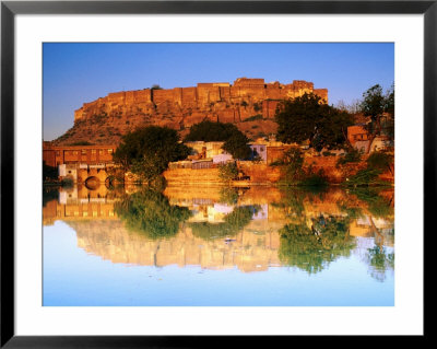 Meherangan Fort Reflected In Pool At Sunset, Jodhpur, India by Anthony Plummer Pricing Limited Edition Print image