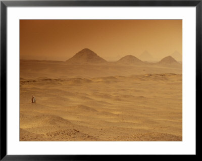 Two Men Cross The Barren Desert At Giza by Kenneth Garrett Pricing Limited Edition Print image