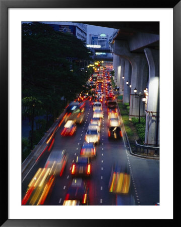Evening Traffic On A Bangkok Street by Richard Nowitz Pricing Limited Edition Print image