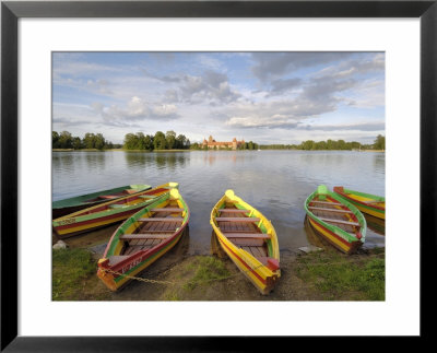 Colourful Rowing Boats And Trakai Castle, Trakai, Near Vilnius, Lithuania, Baltic States by Gary Cook Pricing Limited Edition Print image