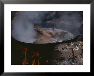 A Pigs Head Assures Prosperity And Good Broth At A Roof Raising by Jodi Cobb Pricing Limited Edition Print image