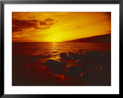 Sunset Over The Ocean As Seen From A Maui Beach by Todd Gipstein Pricing Limited Edition Print image