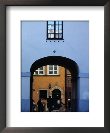 View Of Busy Street Through An Archway In Stare Miasto, Warsaw, Poland by Izzet Keribar Pricing Limited Edition Print image