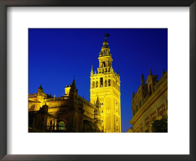 Giralda Illuminated At Night, Seen From Plaza Del Triunfo, Sevilla, Andalucia, Spain by David Tomlinson Pricing Limited Edition Print image