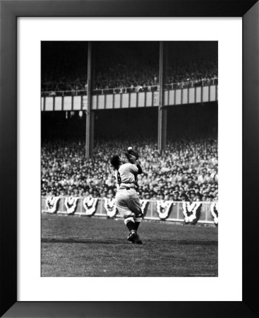 Yankees Catcher Yogi Berra, Chasing A Foul Ball For An Out, In World Series Game by Mark Kauffman Pricing Limited Edition Print image