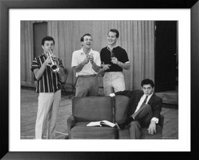 Pat Boone And Bobby Darin Laughing As Paul Anka Sits Brooding And Frankie Avalon Plays The Trumpet by Peter Stackpole Pricing Limited Edition Print image