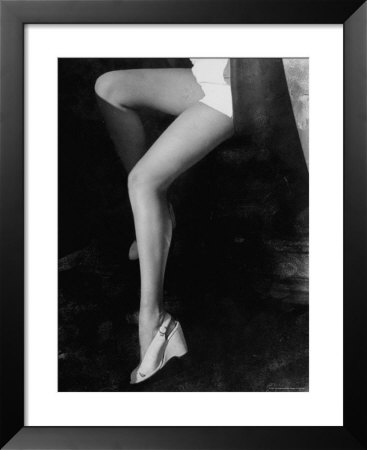 Betty Grable's Famous Legs As She Models White Shorts Sitting In Driver's Seat Of Car by Walter Sanders Pricing Limited Edition Print image