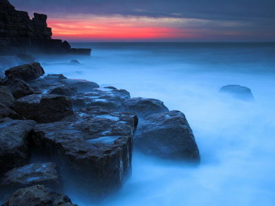 Pink Glow Before Sunrise At Winspit, Dorset, England. Jurassic Coast World Heritage Site by Adam Burton Pricing Limited Edition Print image