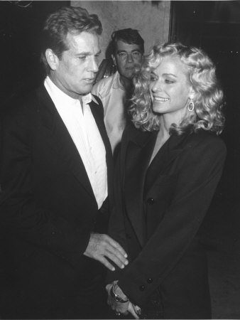 Actors Ryan O'neal And Farrah Fawcett At Wedding For Their Friend Richard Perry by Kevin Winter Pricing Limited Edition Print image