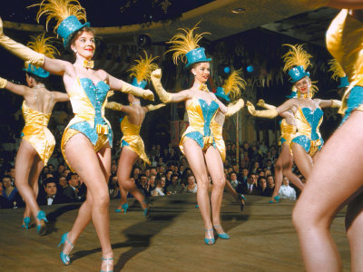 Margaret Kelly Dancers Of England Performing Routine On Stage At The Moulin Rouge Nightclub by Loomis Dean Pricing Limited Edition Print image