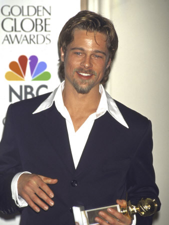 Actor Brad Pitt Holding His Award In Press Room At Golden Globe Awards by Mirek Towski Pricing Limited Edition Print image