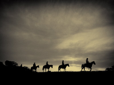Horses And Cowboys On Their Way Home At Sunset by Scott Stulberg Pricing Limited Edition Print image