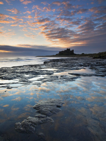 Spectacular Sunrise Over Bamburgh Castle, Bamburgh, Northumberland, England, United Kingdom, Europe by Adam Burton Pricing Limited Edition Print image