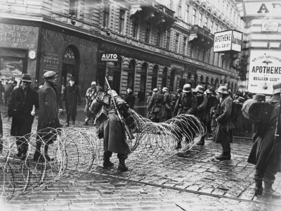 The Military Placing Barbed Wire Across The Street by Robert Hunt Pricing Limited Edition Print image