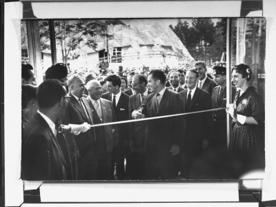Nikita Khrushchev As Richard Nixon Wields Scissors To Cut Ribbon For The American National Exhibit by Howard Sochurek Pricing Limited Edition Print image