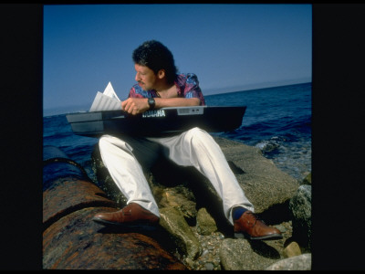 Composer Anthony Davis Sitting By Water Balancing Electric Keybd On His Lap, Perusing Sheet Music by Ted Thai Pricing Limited Edition Print image