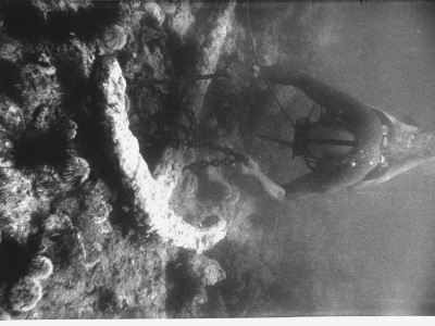 Millionaire Hunter/Scuba Diver Edwin Link Submerged, Struggling To Secure A Chain Around Anchor by Peter Stackpole Pricing Limited Edition Print image