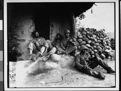 Marine Division Relaxing By Hut, Next To Rock Barricade, After Destroying Enemy Sniper, Korean War by Frank W. Sewell Pricing Limited Edition Print image