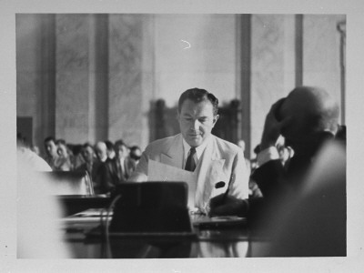 Assistant Attorney General Robert H. Jackson, Looking Away From Senator Hugo L. Black's View by Thomas D. Mcavoy Pricing Limited Edition Print image