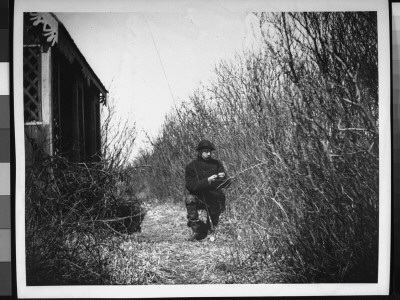 Angler C.G. Levison Of Brooklyn, Ny, Tying A Fly As He Prepares To Fish On Massapequa Pond by Wallace G. Levison Pricing Limited Edition Print image