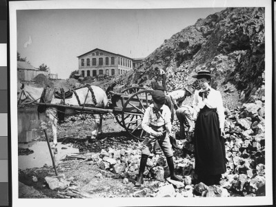 A Young Boy And Girl Investigating Hoxie's Quarry With Workmen In Background by Wallace G. Levison Pricing Limited Edition Print image