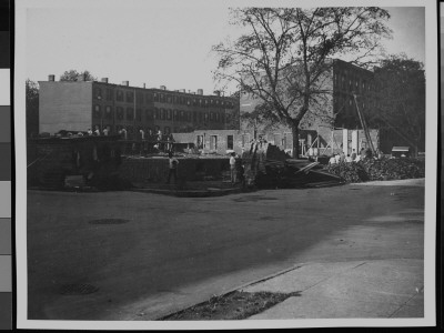 Contruction Of An Apartment House On The Former Site Of The Winslow Plot by Wallace G. Levison Pricing Limited Edition Print image