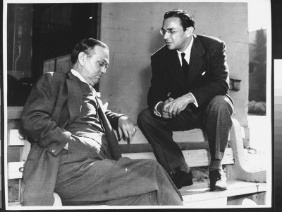 Writer Damon Runyon Sitting On Bench With Unidentified Man by Gjon Mili Pricing Limited Edition Print image