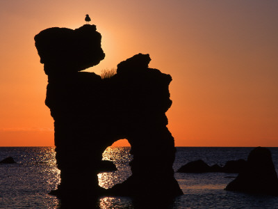 Silhouette Of Rock Formations In The Sea, Gotland, Sweden by Jorgen Larsson Pricing Limited Edition Print image