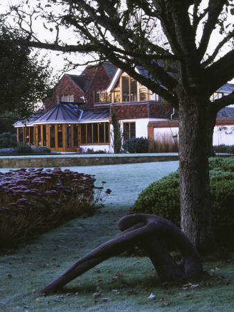 Sculpture By Helen Sinclair On The Frosty Lawn Beside A Hebe And Sedum 'Autumn Joy' by Clive Nichols Pricing Limited Edition Print image