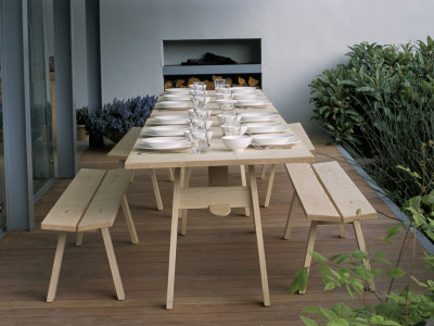 Dining Deck Beside The Pavilion Kitchen With Wooden Table And Chairs, Chelsea 2004 by Clive Nichols Pricing Limited Edition Print image