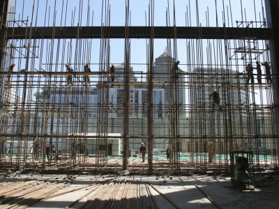 Construction Workers Build A Curtain Wall At The Cyts Project In Donghzimen In Beijing By Gmp by Ben Mcmillan Pricing Limited Edition Print image