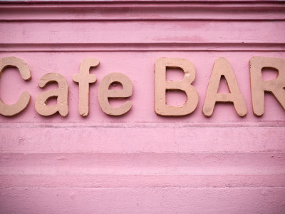 Pink Cafe - Bar Sign, Prague, Czech Republic by Olwen Croft Pricing Limited Edition Print image