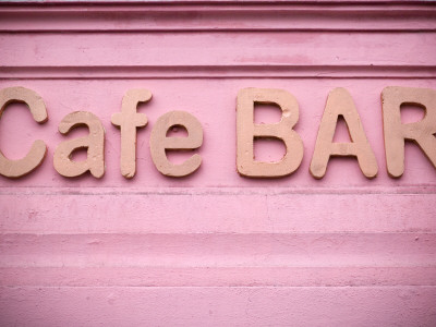 Pink Cafe - Bar Sign, Prague, Czech Republic by Olwen Croft Pricing Limited Edition Print image