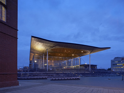 National Assembly For Wales, Cardiff, Exterior At Dusk From Public Walkway by Richard Bryant Pricing Limited Edition Print image