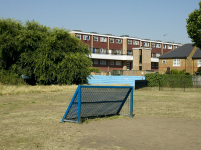 Housing, Kingston-Upon-Thames, Surrey, Metal Goal With Housing In The Background by Tim Mitchell Pricing Limited Edition Print image
