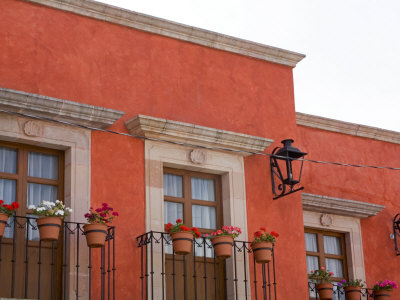 Flower Pots On Balcony, San Miguel De Allende, Guanajuato State, Mexico by Julie Eggers Pricing Limited Edition Print image