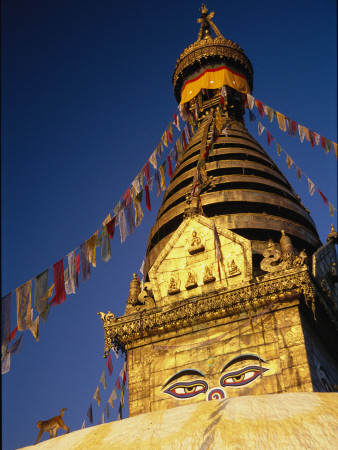Prayer Flags Wave In The Breeze At Swayambhunath Temple by Michael Melford Pricing Limited Edition Print image