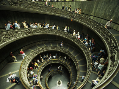 Tourists Descend The Double Spiral Staircase In The Vatican Museums by Paul Chesley Pricing Limited Edition Print image