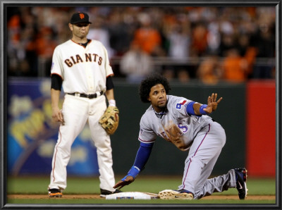 Texas Rangers V San Francisco Giants, Game 2: Elvis Andrus, Freddy Sanchez by Doug Pensinger Pricing Limited Edition Print image