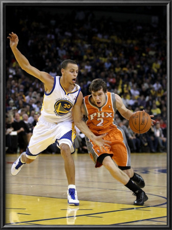 Phoenix Suns V Golden State Warriors: Goran Dragic And Stephen Curry by Ezra Shaw Pricing Limited Edition Print image