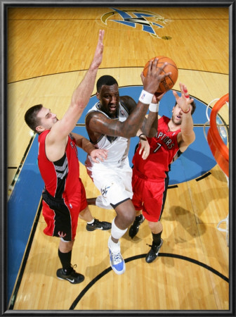 Toronto Raptors V Washington Wizards: Andray Blatche, Linas Kleiza And Andrea Bargnani by Ned Dishman Pricing Limited Edition Print image