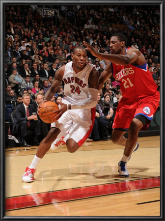 Philadelphia 76Ers V Toronto Raptors: Sonny Weems And Thaddeus Young by Ron Turenne Pricing Limited Edition Print image