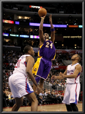 Los Angeles Lakers V Los Angeles Clippers: Kobe Bryant, Jarron Collins And Eric Gordon by Stephen Dunn Pricing Limited Edition Print image