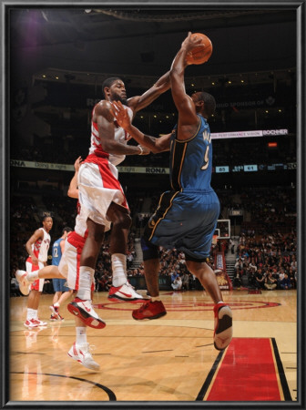 Washington Wizards V Toronto Raptors: Amir Johnson And Gilbert Arenas by Ron Turenne Pricing Limited Edition Print image
